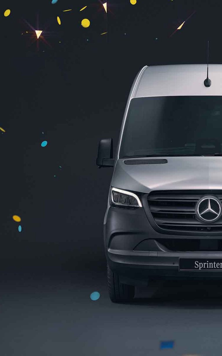 Der Mercedes-Benz Sprinter vor einem schwarzen Hintergrund mit Konfetti zum feiern des 30-jährigen Jubiläums.